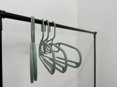a bunch of utensils hanging on a rack at Serenity Haven Family Stay Ipoh 10-12 Pax in Ipoh