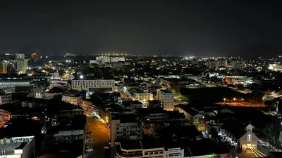 a view of a city at night with lights at Ipoh City Centre Penthouse 12-15 Pax KTV BBQ in Ipoh