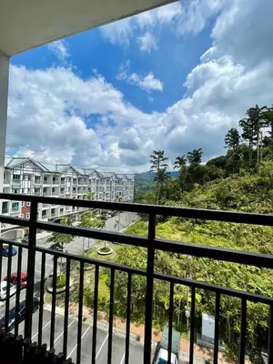 a view from the balcony of a resort at AYAAN ORCHID Fifa Home at Golden Hill Night Market in Brinchang