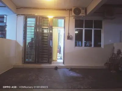 a room with a door and a window with a speaker at Homestay Bajet EM1 Pantai Remis PK in Pantai Remis
