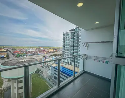 an apartment balcony with a view of a city at \u7a3b\u5cb8 DaoAn Homestay-with balcony in Sekincan