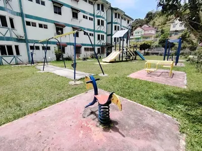 a park with a playground with a play equipment at Puncak Cameron Holiday in Cameron Highlands