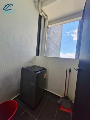 a small bathroom with a toilet and a window at Urban Suites Apartment In Jelutong George Town in George Town