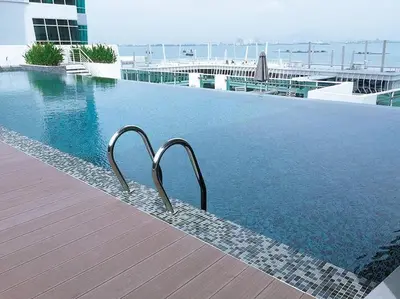 a swimming pool on top of a building at \u3010SeaView\u3011High Floor 2BR Duplex SeaFront-Town 21 in George Town