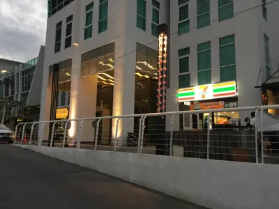 a building with a fence in front of it at \u3010SeaView\u3011High Floor 2BR Duplex SeaFront-Town 21 in George Town