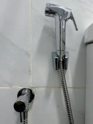 a shower head and a hose in a bathroom at #15mins walk to Kea Farm#4bedrooms4bathrooms#10pax in Brinchang