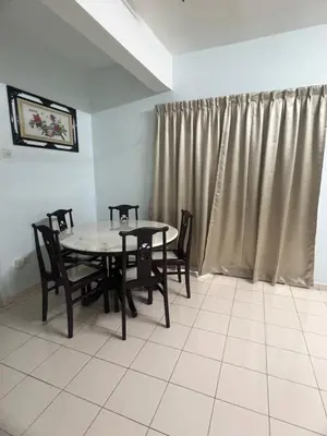 a dining room with a table and chairs and a window at Lake View From Bed Peaceful Getaway Home in Ipoh