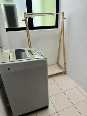 a washing machine in a room with a window at Big Big Big family escape 4BR side pool view, Ipoh in Ipoh