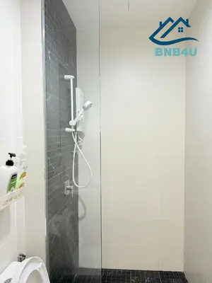 a shower stall in a bathroom with a toilet at Beacon Executive Suite in Jalan Sungai Pinang George Town in George Town