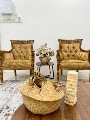 a room with two chairs and a basket on a table at Silibin Family 4B3B Homestay 11pax by Iconique in Ipoh