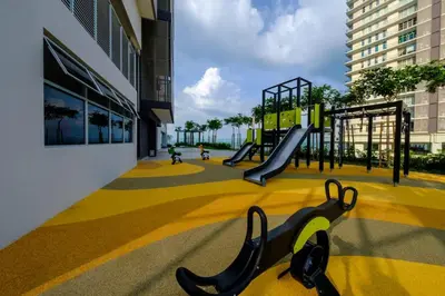 a playground with a slide in a building at Seaview Studio 2BR 3BR Tanjung Point Residences in Tanjong Tokong