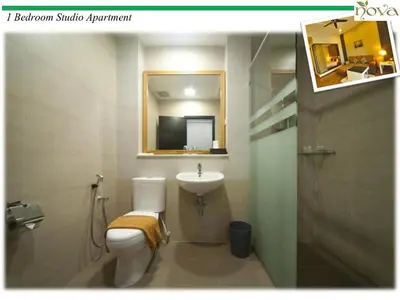 a bathroom with a sink and a toilet and a mirror at Cameron Nova Highlands Resort VII in Brinchang
