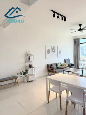 a white living room with a couch and a table at Beacon 2 bedroom at Jalan Sungai Pinang George Town Penang in George Town