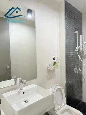 a bathroom with a sink and a toilet and a mirror at Beacon 2 bedroom at Jalan Sungai Pinang George Town Penang in George Town