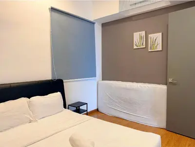 a bedroom with a bed and a window at Beacon 2BR with Infinity Pool at Jalan Sungai Pinang George Town Penang in George Town