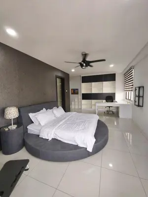 a bedroom with a large bed with a ceiling fan at RoomB w attached bathroom w bathtub in George Town
