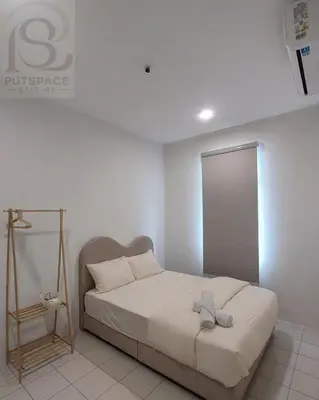 a bedroom with a bed in a room at Putspace Empire-Bandar Baru Putra, Ipoh Perak in Ipoh