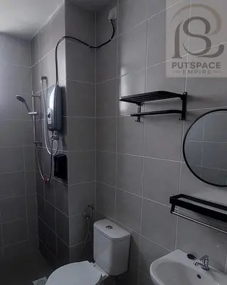 a bathroom with a toilet and a sink at Putspace Empire-Bandar Baru Putra, Ipoh Perak in Ipoh