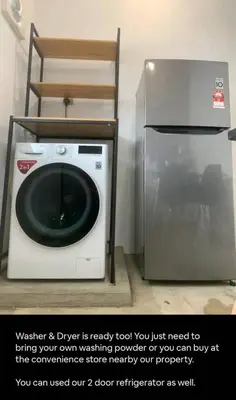 a washing machine and a refrigerator in a room at Bukit Mertajam 1 pax Salesman 5pm to 8am Room in Bukit Mertajam