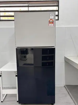 a refrigerator sitting in a room with a table at Free EV Car Charge KTV Snooker&PS5Game 13Pax Ipoh in Ipoh
