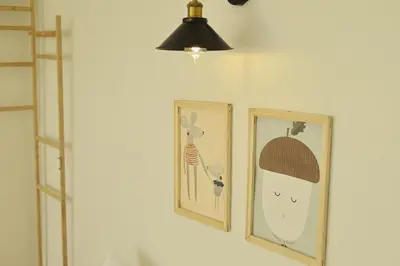 three picture frames on a wall with a kawaii at Sarang A Cottage with private pool in Sungai Petani