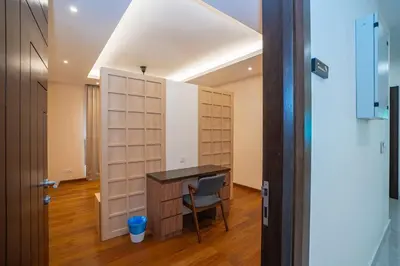 a room with a desk and a chair in a room at Cheekaaboo Playhouse Ipoh I Private Pool Family Stay with Indoor Playzone in Ipoh