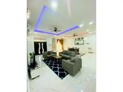 a living room with a couch and a ceiling at Hijrah De La Villa Parit Buntar Nibong Tebal Penang in Nibung Tebal
