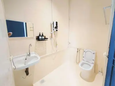 a bathroom with a sink and a toilet at Ipoh Tambun Field - Landed House 9px - 3R2B in Ipoh