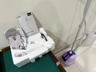 a pretend bathroom with a sink and a mop at Hatasan Homestay Guess House