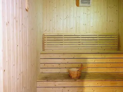 a wicker basket sitting next to a wooden sauna at Majestic Condo Top Floor 2room Smart TV & WiFi in Ipoh