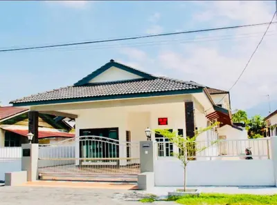 a small white house with a roof at Taiping Nest Homestay 3BR, 7Pax, WiFi, Private Parking, Comfy in Taiping