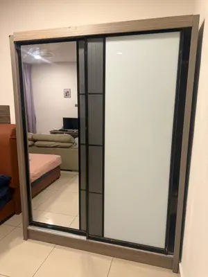 a sliding glass door with a white screen in a room at Studio Unit Trefoil Setia Alam in Gua Sai