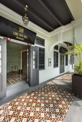 an entrance to a building with a tiled floor at Loke Thye Kee Heritage Suite Hotel's in Gua Sai