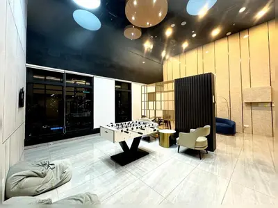 a room with a foos ball on a table in a building at High Floor sea view 12 pax 3BR luxury suites b29 in Jelutong