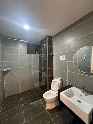 a bathroom with a toilet and a sink at Sunway Onsen superb view 4-6 pax in Tambun