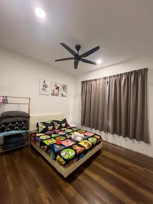 a bedroom with a bed and a ceiling fan at Sunway Onsen superb view 4-6 pax in Tambun