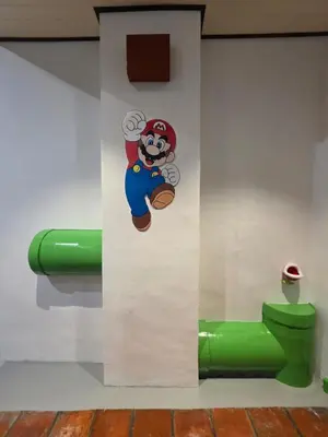 a wall with a sticker of mickey mouse on it at New ! 6 Pax Super Mario Georgetown Heritage Pre-war House 2 Bedroom in George Town