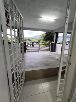 a view of a balcony from inside a building at Homestay Rumah Iman in Kamunting
