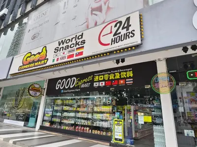 a store front of a grocery store with many signs at Landmark Seaview Cozy Family Suite with Balcony 6 Pax in Tanjong Tokong