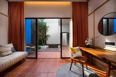 a living room with a couch and a table at Cheong Fatt Tze - The Qing Suites in George Town