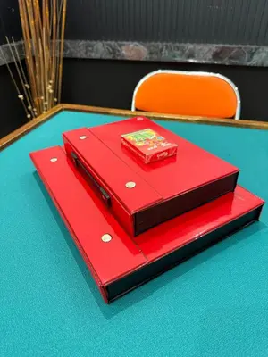 a red box sitting on top of a table at LYL 108 Private Pool Villa in Ipoh