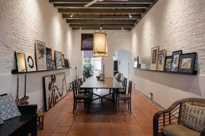 a dining room with a table and chairs at Cheong Fatt Tze - The Townhouses in George Town