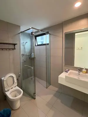 a bathroom with a shower and a toilet and a sink at High floor Seaview 2BR Jazz Suite Bathtub &Sauna in Tanjong Tokong