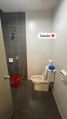a bathroom with a toilet and a sign that reads tamales at Barrington Square Aleysha Homestay Night Market in Brinchang