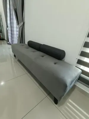 a couch sitting on the floor in a room at Lahat Serenity 168 Big Corner Cozy House in Lahat
