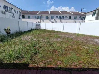 a fence in a yard next to a building at Lahat Serenity 168 Big Corner Cozy House in Lahat