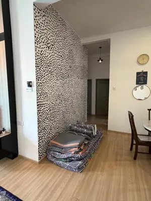 a room with a wall with a pile of blankets at AYAAN GAMING CLUB House with PS4 & Table Tennis at Cameron Highland in Tanah Rata