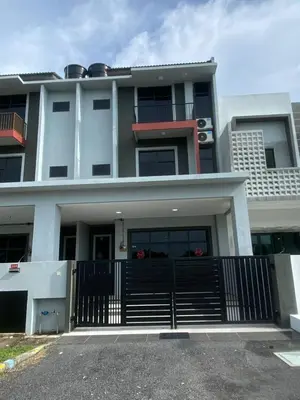 a large white building with a black gate at 96 HomeStay Sungai Besar in Sungai Besar