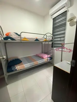 a room with two bunk beds in a room at HongStay SUNGAI BESAR in Sungai Besar