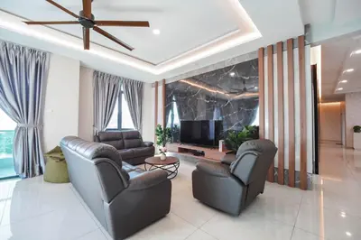 a living room with two couches and a television at 22 Penthouse by BRB, Airport View & 18 Pax in Bayan Lepas